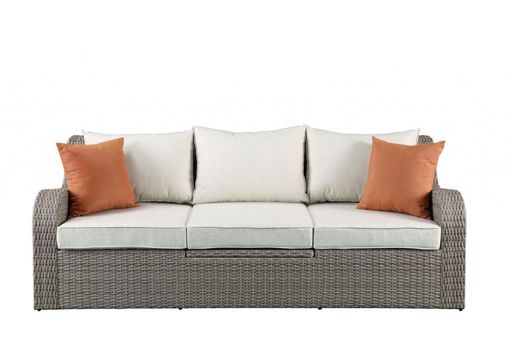 3-Piece Outdoor Gray Wicker Sectional Seating Group - Sofa and Ottomans with Beige Cushions and Glass-Top Coffee Table  Warm Home View
