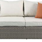 Three Piece Outdoor Gray Wicker Sectional Seating Group with Beige Cushions  Warm Home View