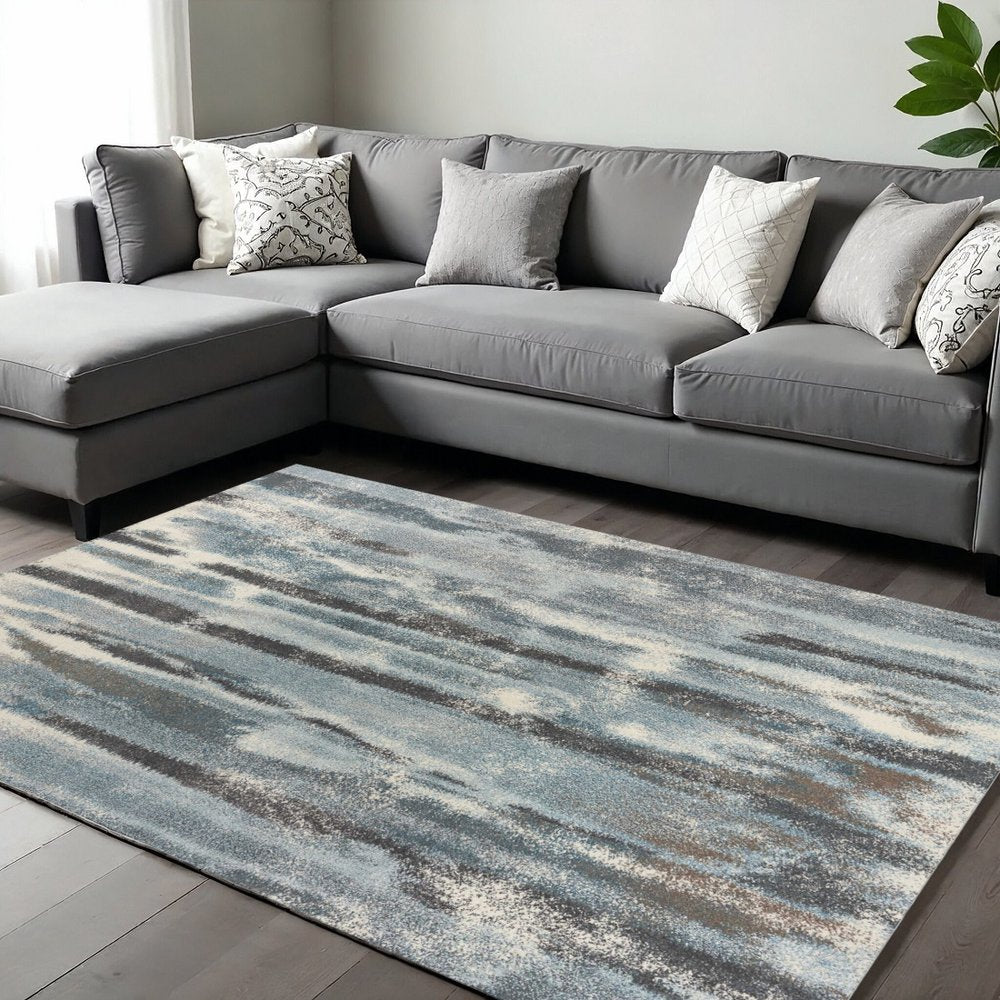 9' X 13' Teal Blue And White Abstract Area Rug  Warm Home View
