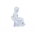 Vintage Look Off White Boy Sitting Statue  Warm Home View