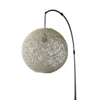 77" Antiqued Bronze Arched Floor Lamp With Groovy Beige Abstract Wicker Globe Shade  Warm Home View