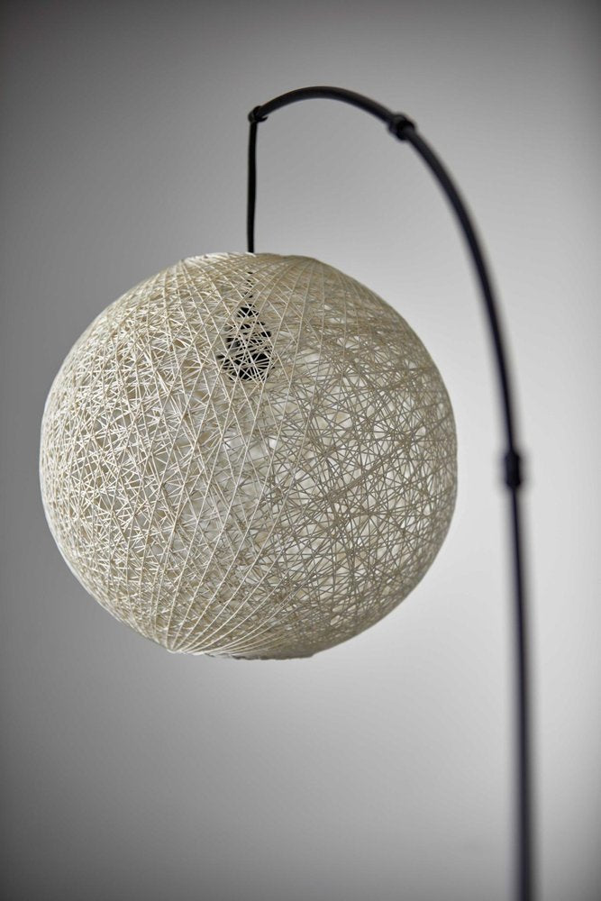 77" Antiqued Bronze Arched Floor Lamp With Groovy Beige Abstract Wicker Globe Shade  Warm Home View