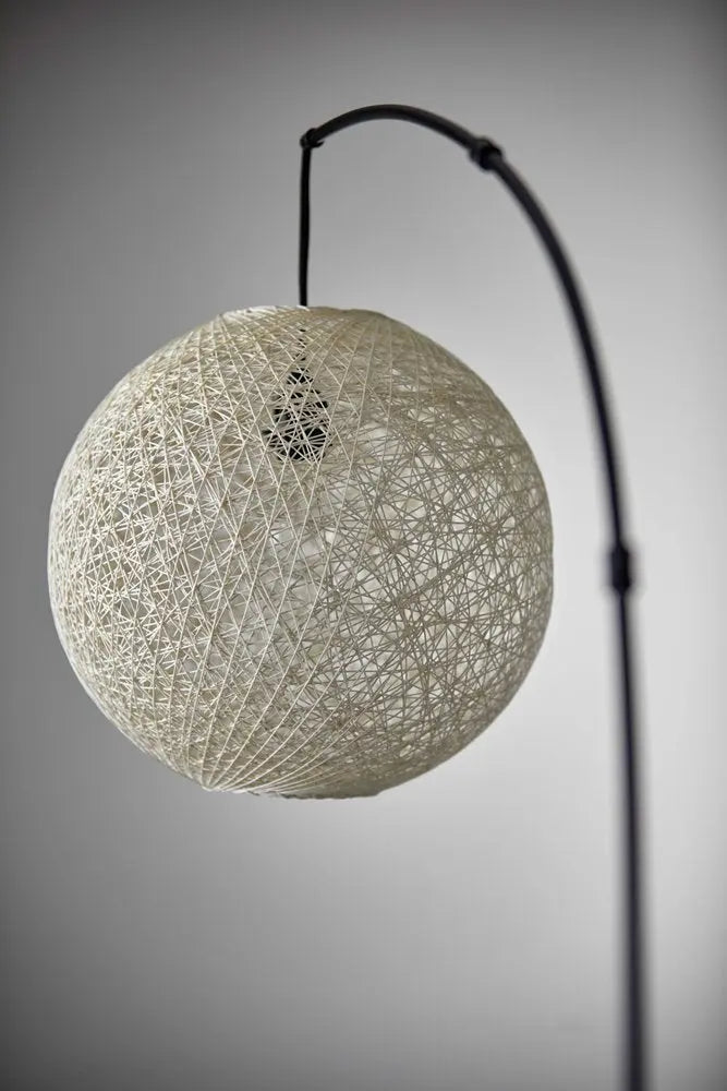 77" Antiqued Bronze Arched Floor Lamp With Groovy Beige Abstract Wicker Globe Shade  Warm Home View