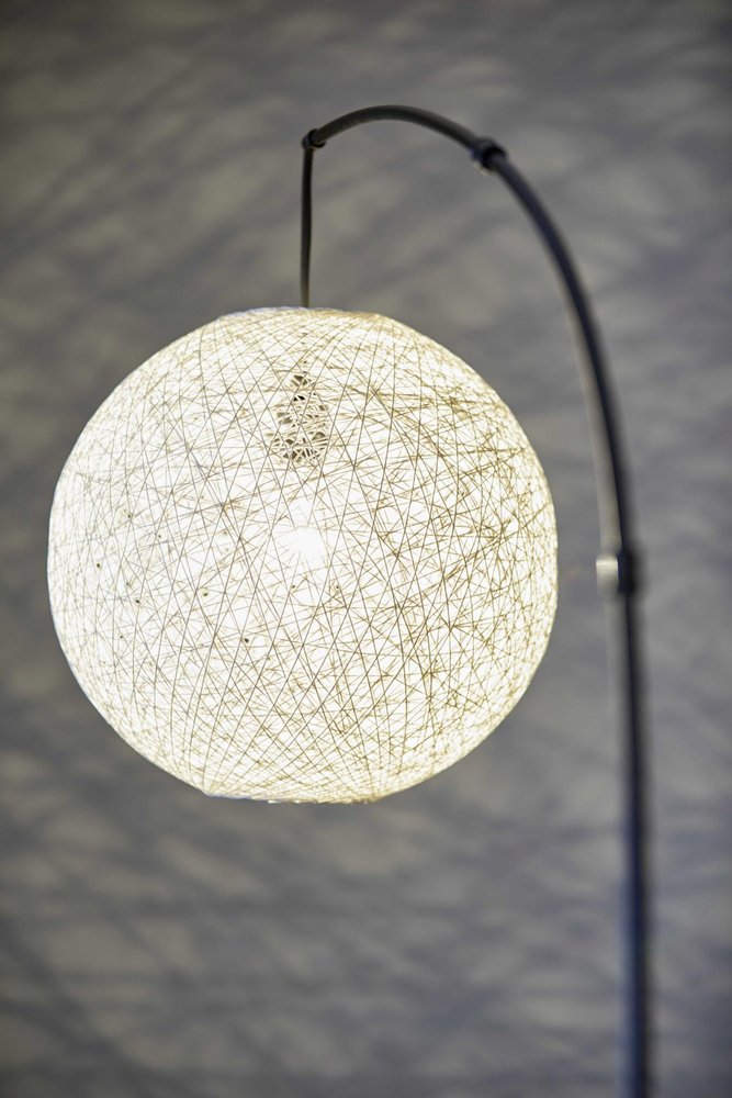 77" Antiqued Bronze Arched Floor Lamp With Groovy Beige Abstract Wicker Globe Shade  Warm Home View