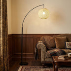 77" Antiqued Bronze Arched Floor Lamp With Groovy Beige Abstract Wicker Globe Shade  Warm Home View