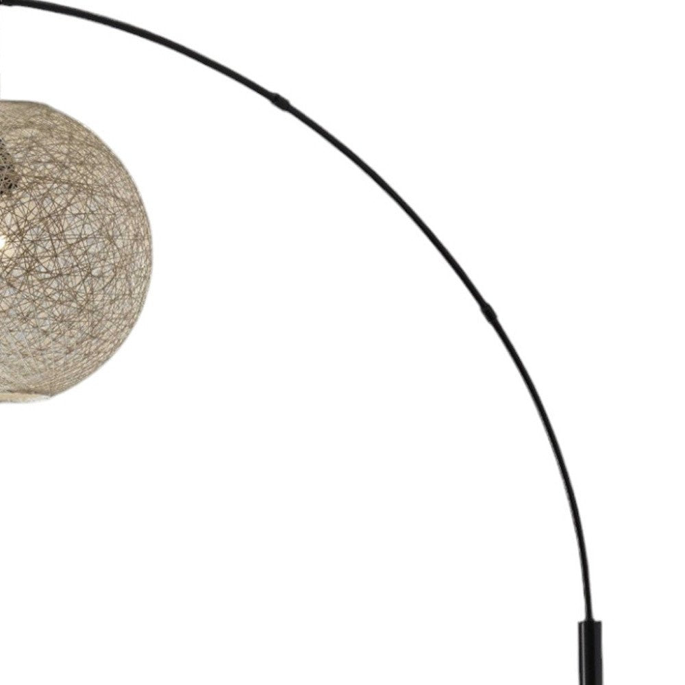 77" Antiqued Bronze Arched Floor Lamp With Groovy Beige Abstract Wicker Globe Shade  Warm Home View
