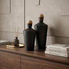 Set of Two Black and Brown Metal Cylindrical Urns  Warm Home View