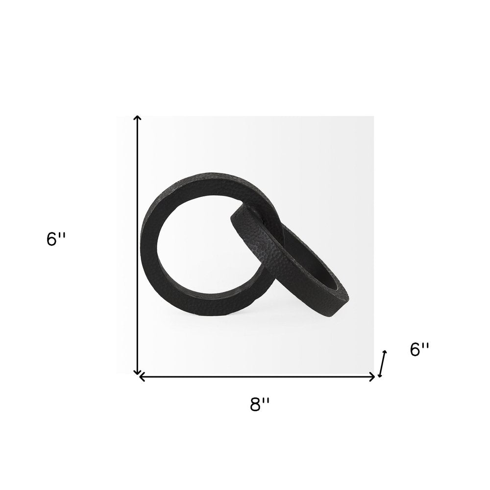 Two Ring Black Hammered Metal Sculpture  Warm Home View