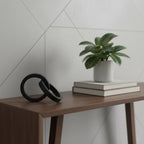 Two Ring Black Hammered Metal Sculpture  Warm Home View