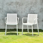 Set of Two White Heavy Duty Plastic Outdoor Stacking Arm Chairs – Weather Resistant  Warm Home View