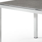 63" Dark Gray and Silver Ceramic Glass and Stainless Steel Outdoor Dining Table  Warm Home View