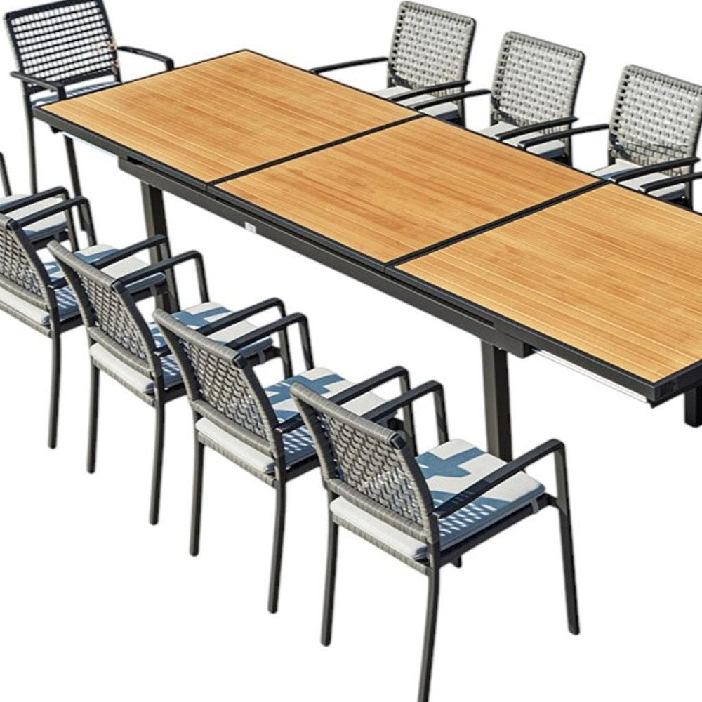 13 Piece Natural and Black Solid Wood Dining Set with Twelve Chairs  Warm Home View