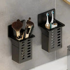 1pc Modern Wall-Mounted Bathroom Organizer holding toothbrushes and toothpaste in a sleek black design.