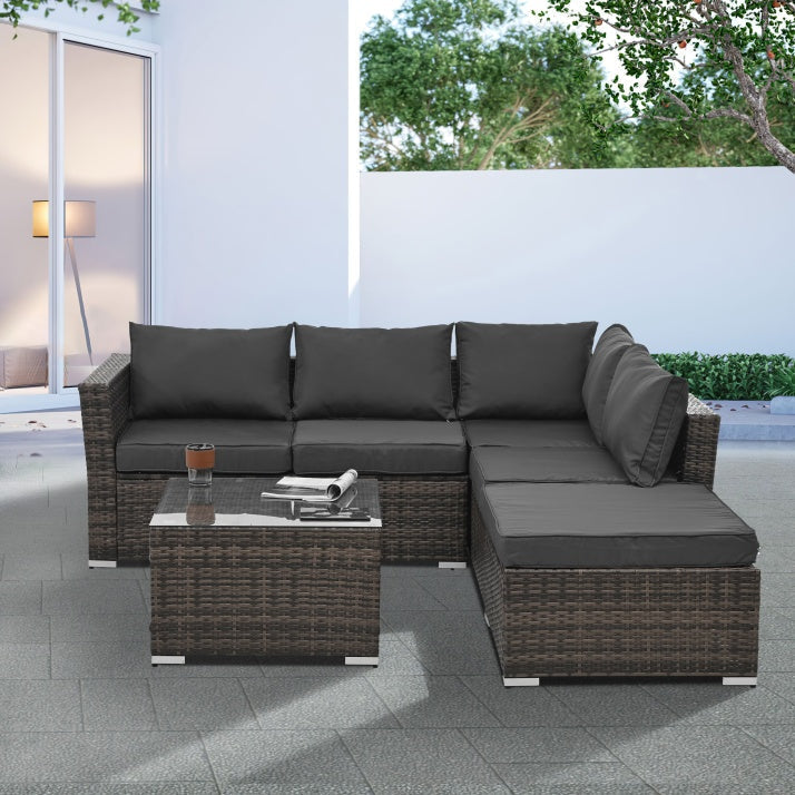 4-Piece Seasonal PE Wicker Patio Furniture Set with Tempered Glass Table - Brown  Warm Home View