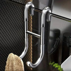 Rust Resistant Multifunctional Shower Door Hook displayed on a sleek bathroom wall, ideal for towels and loofahs.